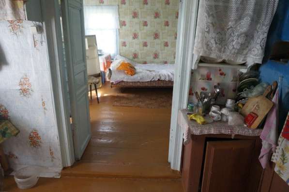 Бревенчатый дом в жилой деревне в Москве фото 12