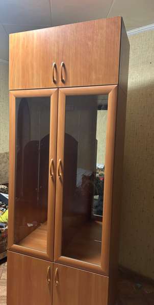 Продается вместительный светло-коричневый деревянный шкаф