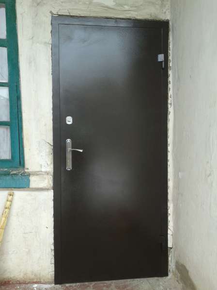 Металлические двери, решетки, ворота, заборы в фото 3