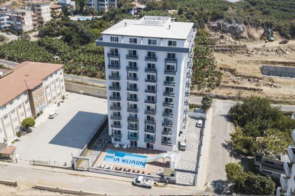 Новые квартиры 1+1 в новом комплексе. Турция/Махмутлар в фото 6