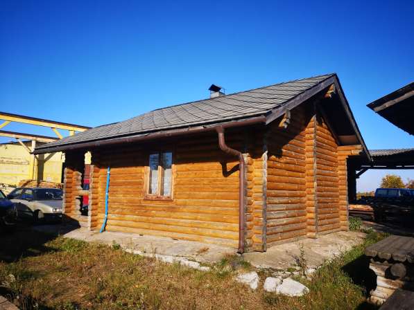 Деревянный дом из бревна d200мм в фото 9