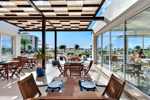 Квартиры в курортном комплексе на море на Северном Кипре в фото 6